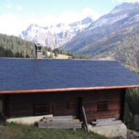 Toiture en montagne avec Eternit et Ferblanterie en cuivre